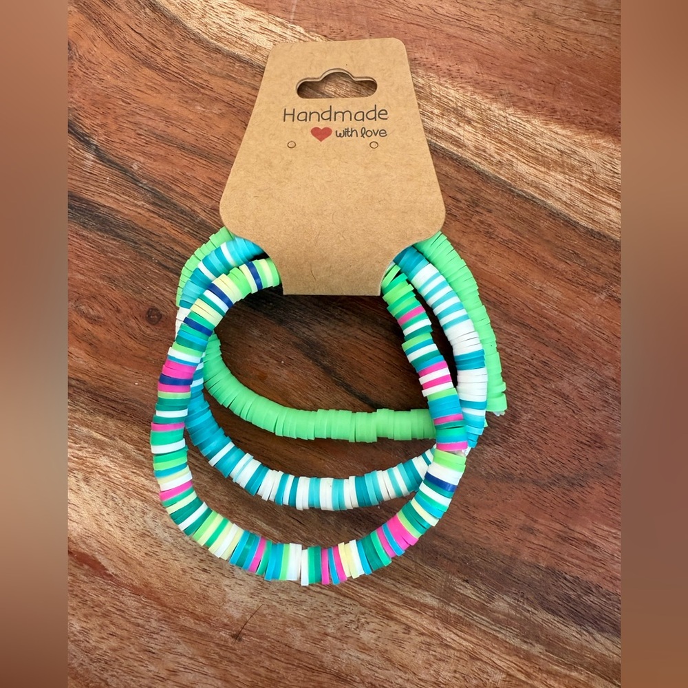 New set of 3 neon pink green blue stretch disc bracelets
